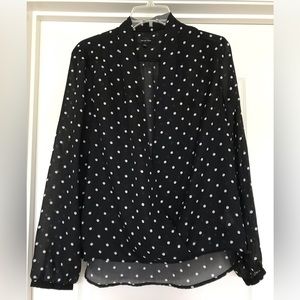 Black, long sleeve, sheer blouse with white polka dots